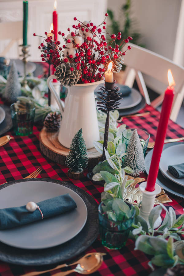 Berries in a jug on a festive dinner table