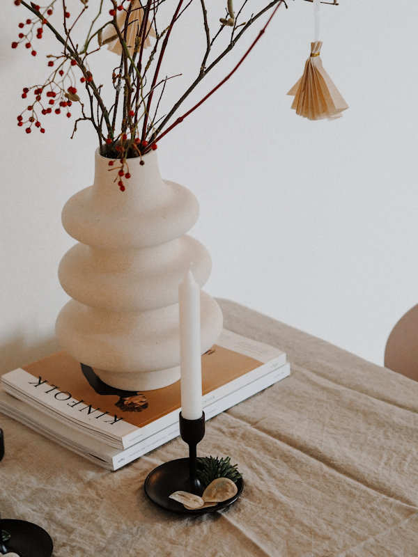 Twigs and berries in a vase